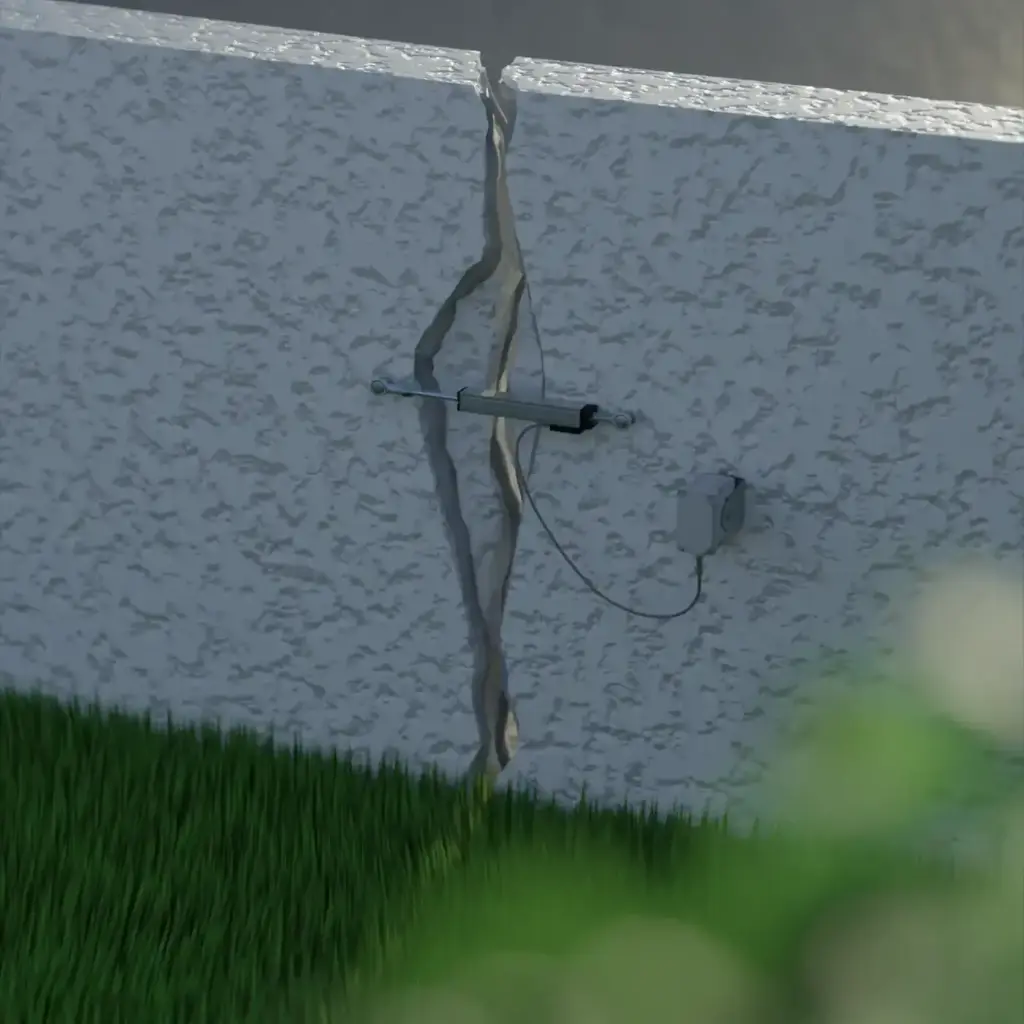 capteur_DELTA_XL_surveillance_fissure_villa_mur_exterieur.webp